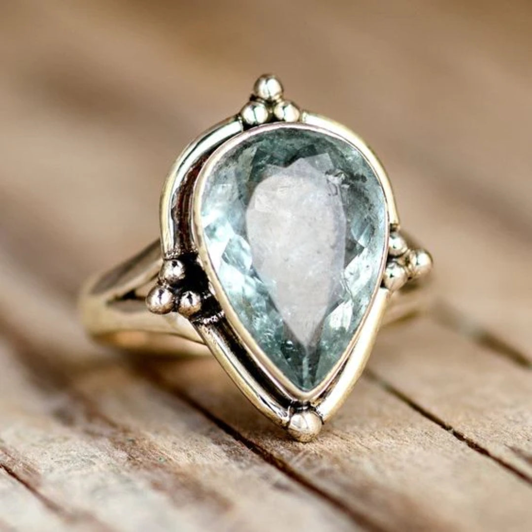 Ring with blue crystal inlay