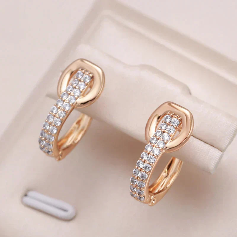 Elegant earrings with inlaid zirconia in gold