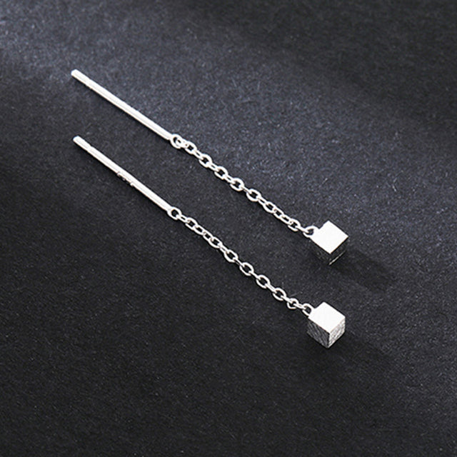 Cubic dangling earrings