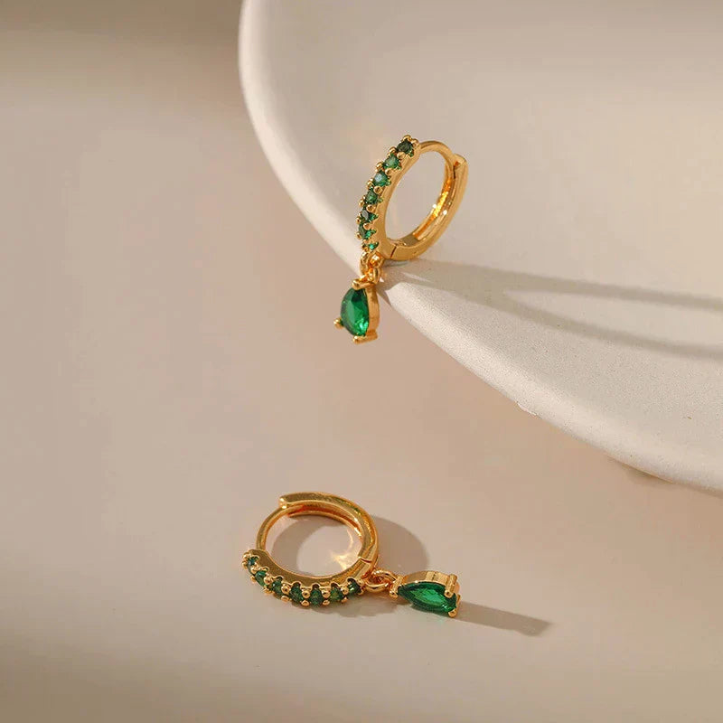 Zirconia earrings with emerald in gold