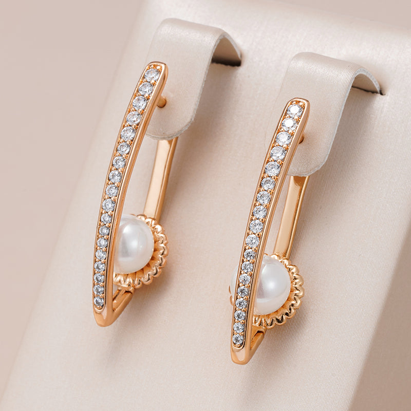 Elegant earrings with rhinestones and pearls