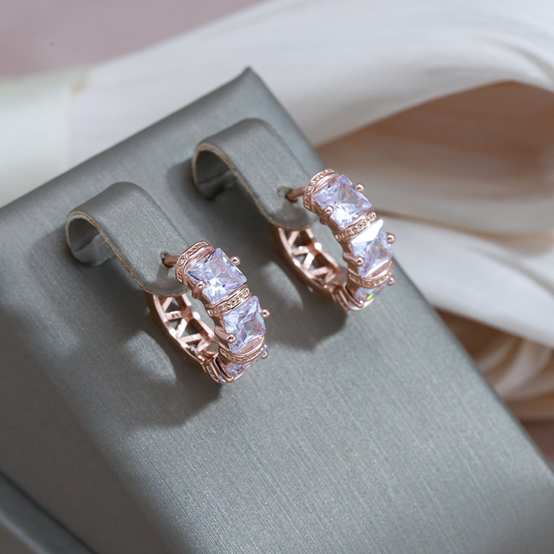 Elegant earrings inlaid with golden crystals