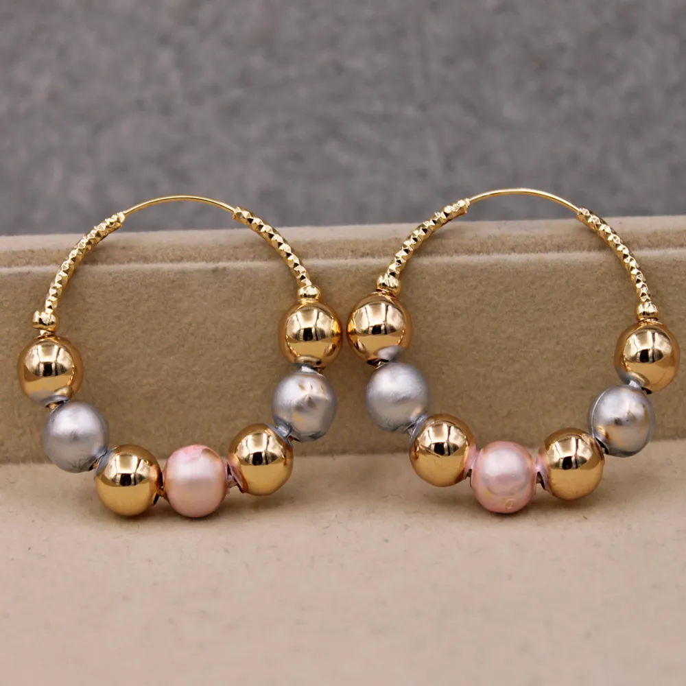 Golden earrings with vintage beads