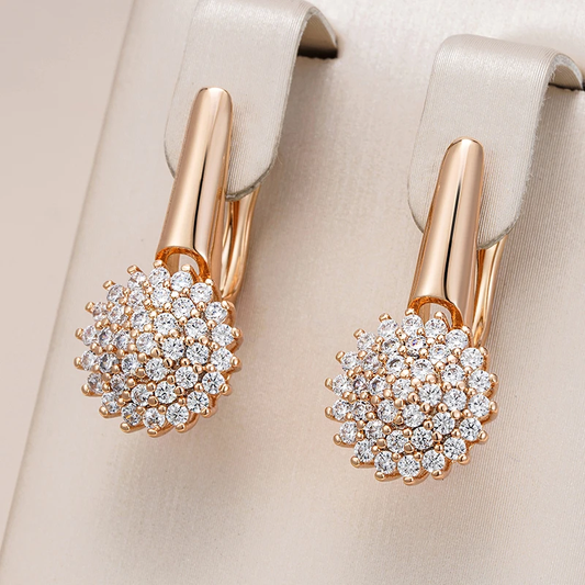 Elegant zirconium flower earrings in gold