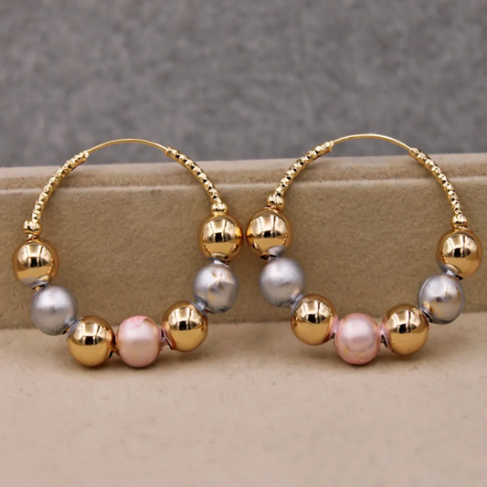Golden earrings with vintage beads