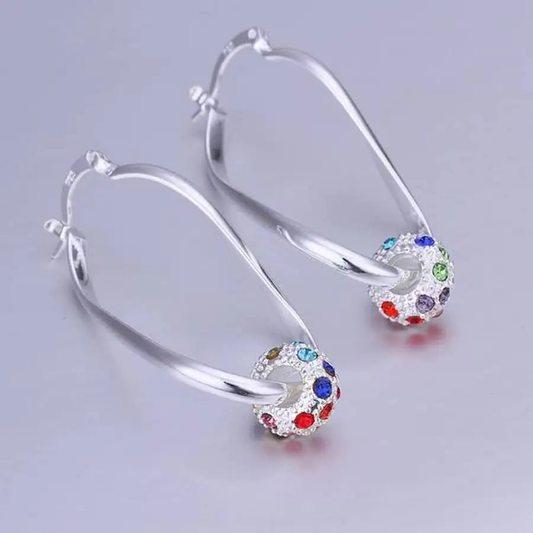 Multicolored earrings with beads in shining silver