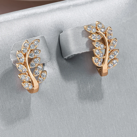Elegant earrings with inlaid zirconia leaves