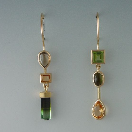 Vintage earrings with hanging green stones